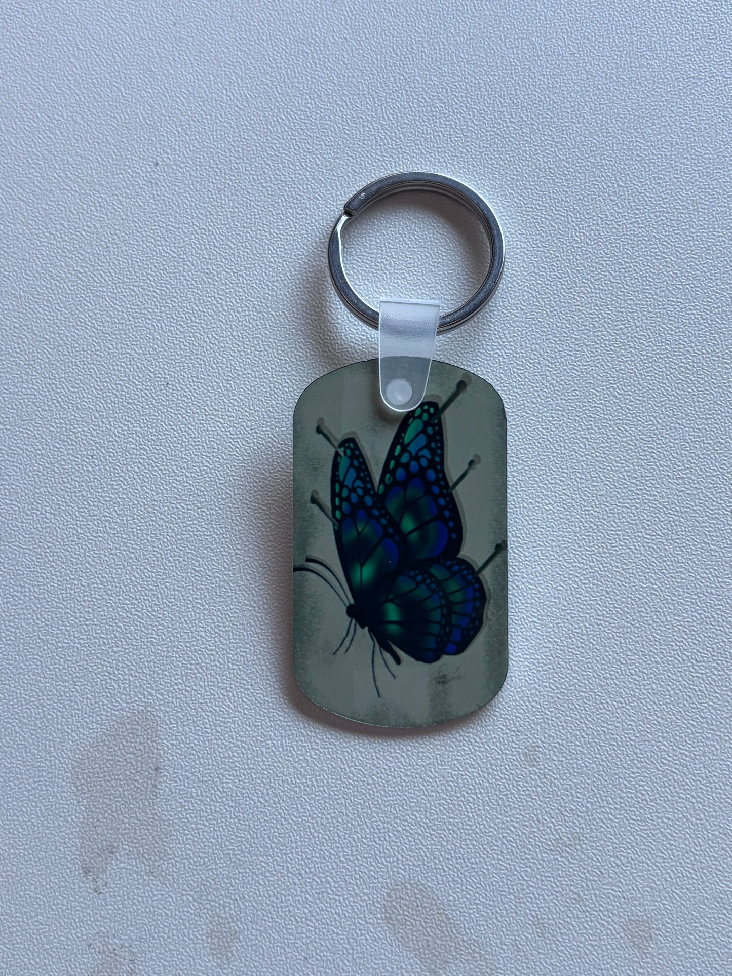 PORTE CLE PAPILLON EPINGLE
