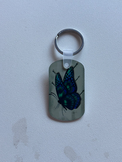 PORTE CLE PAPILLON EPINGLE