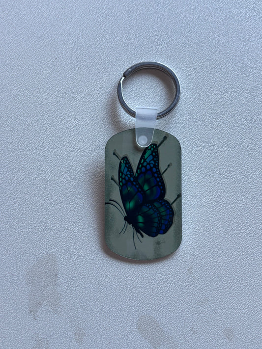 PORTE CLE PAPILLON EPINGLE